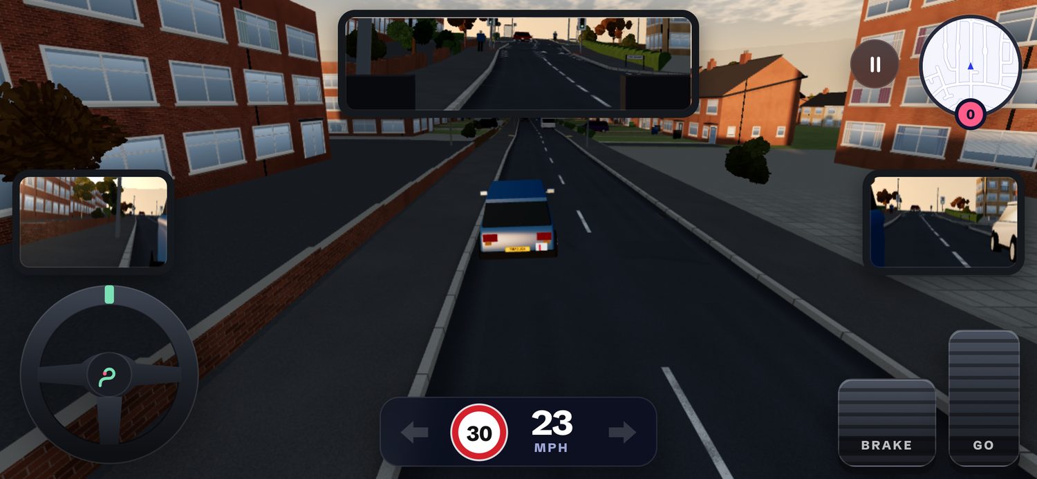 The game on a phone held sideways, with a steering wheel on the left and Brake and Go pedals on the right